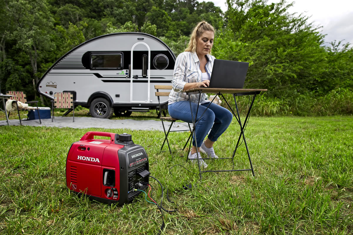 Honda EU2200i generators paralleled for extra power at an outdoor event