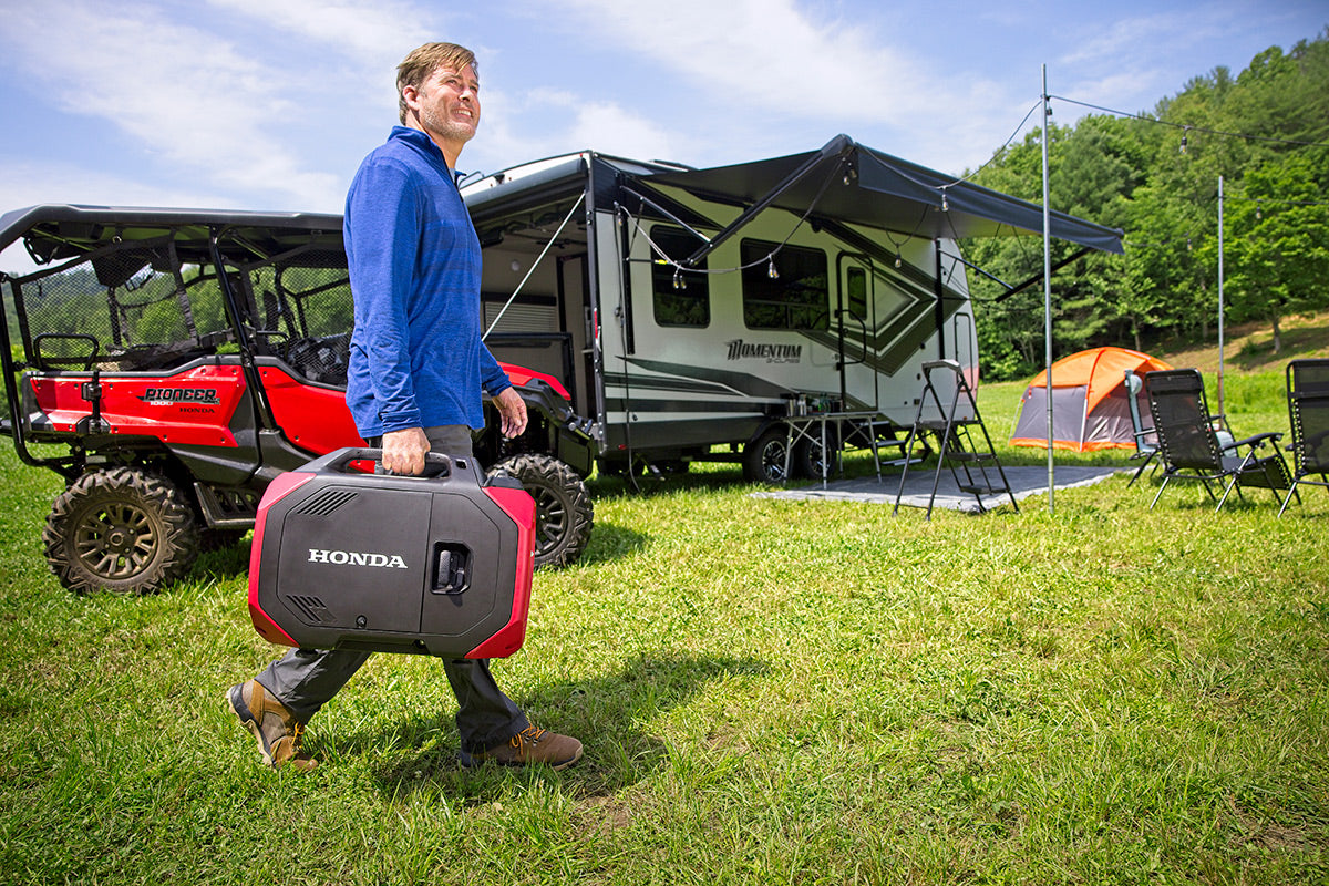 Carrying the 59 lb Honda EU3200i generator by its two integrated handles