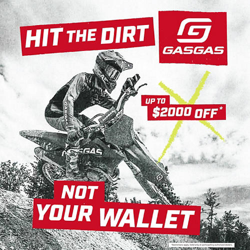 Motocross advertisement with rider on bike, GasGas logo, and promotional text.