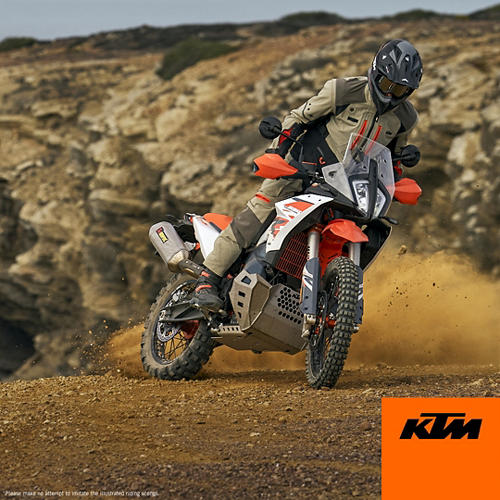 Person riding a KTM 390 Adventure on a rocky terrain
