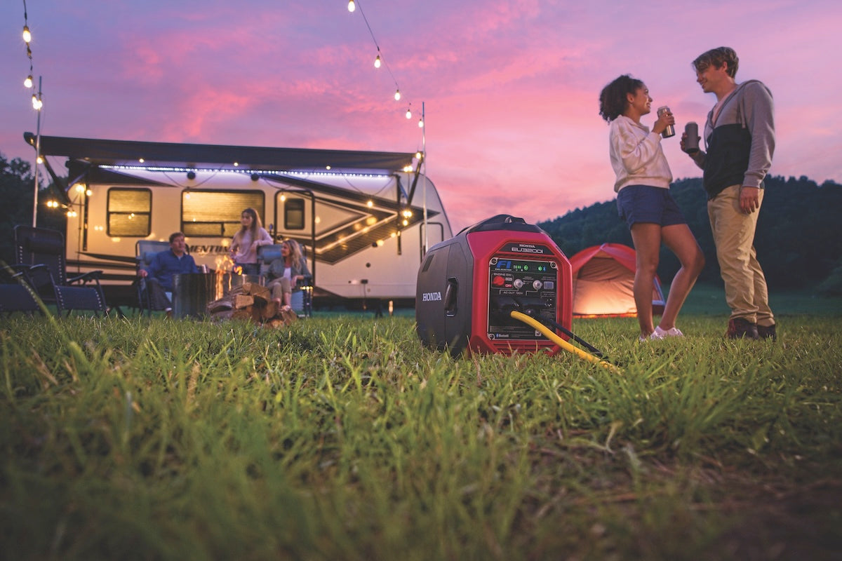 Honda EU3200i generator powering an RV air conditioner at a campsite